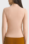 LC264659-P2010-S, LC264659-P2010-M, LC264659-P2010-L, LC264659-P2010-XL, Apricot Pink Half Zipper Long Sleeve Slim Fit Active Top