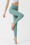 Moonlight Jade Side Pocket Criss Cross Straps High Waist Sports Leggings